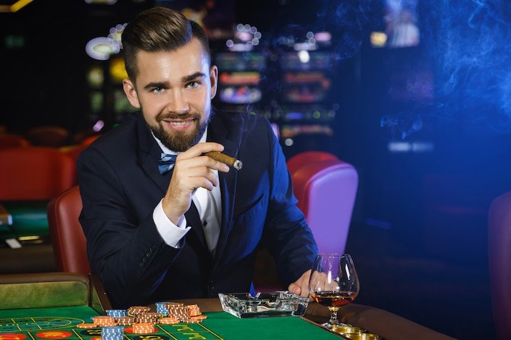 BandarQ card game interface on koinbola showing player hands and dealer position